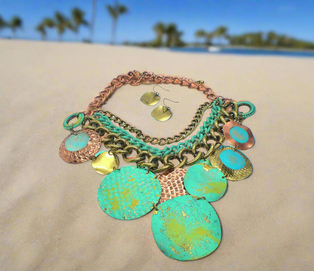 https://www.artistryjewelry.net/products/green-patina-dangle-necklace-set