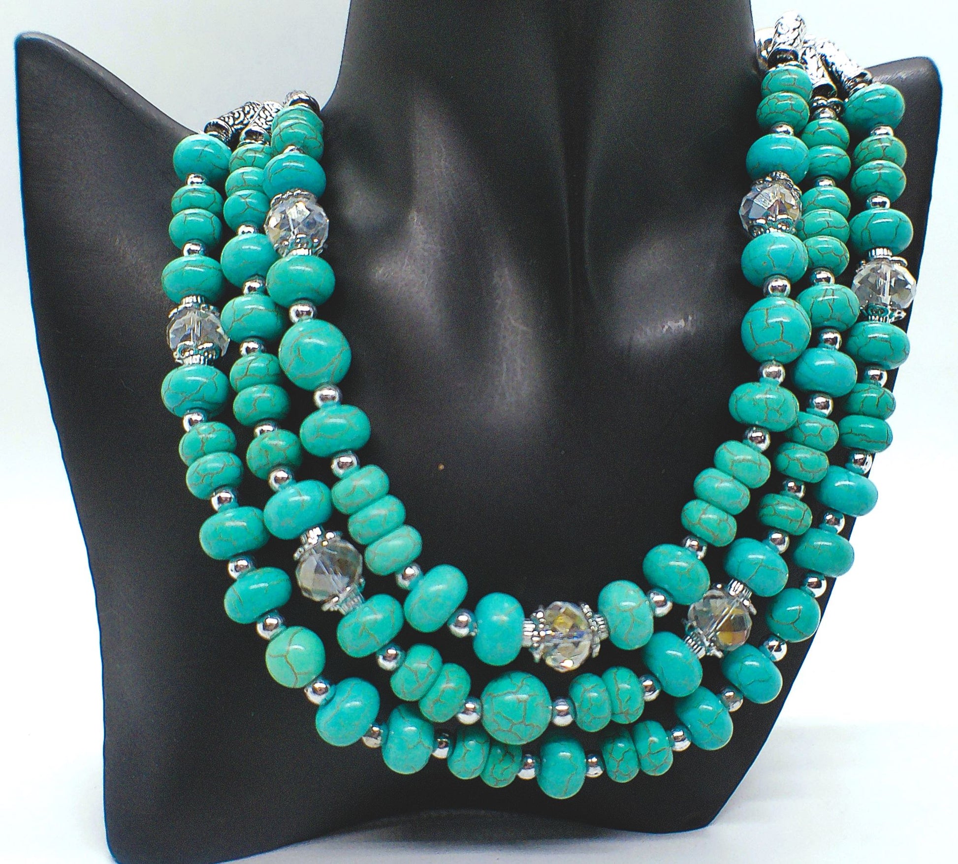 https://www.artistryjewelry.net/products/turquiose-and-silver-necklace-set