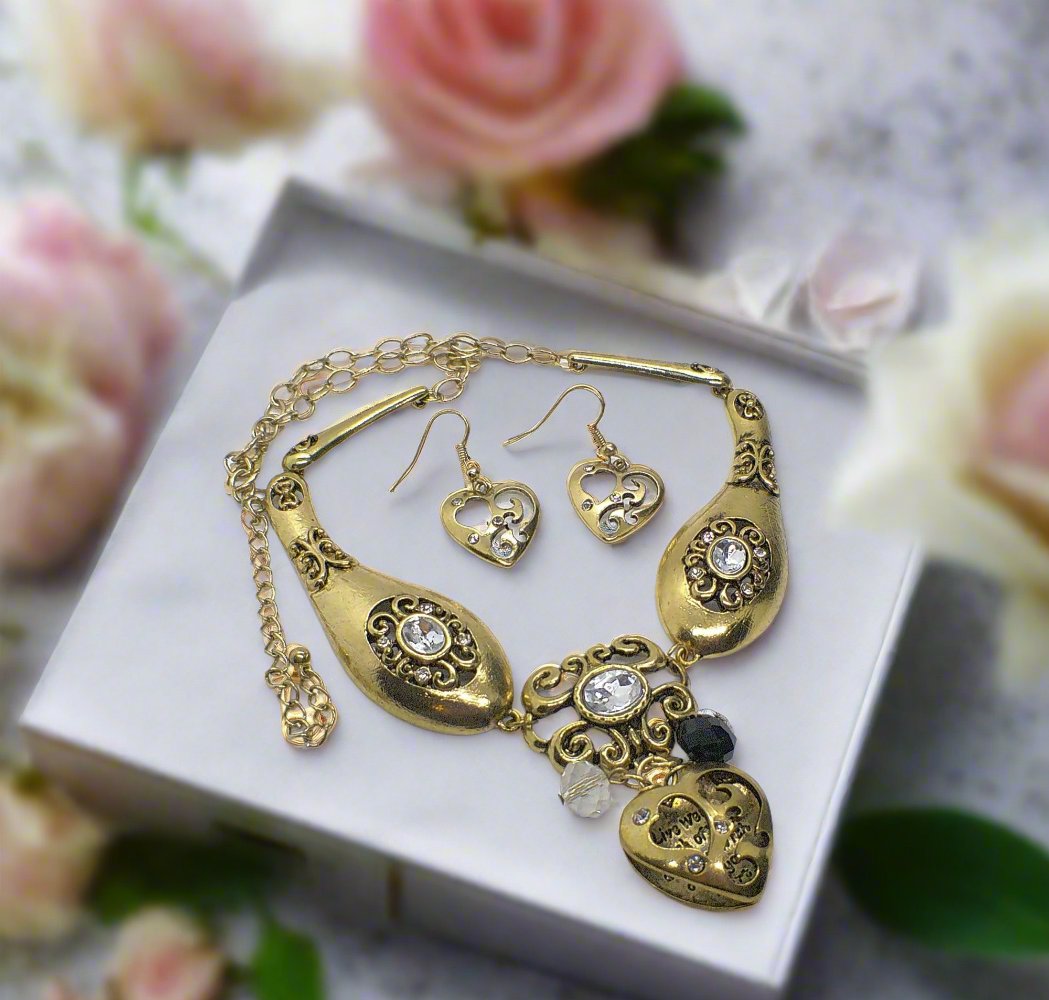 https://www.artistryjewelry.net/products/heart-and-rhinestone-necklace-set