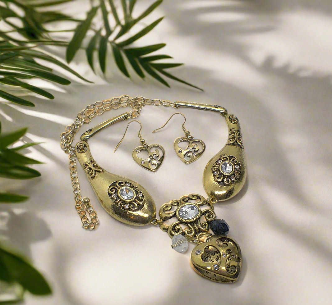 https://www.artistryjewelry.net/products/heart-and-rhinestone-necklace-set