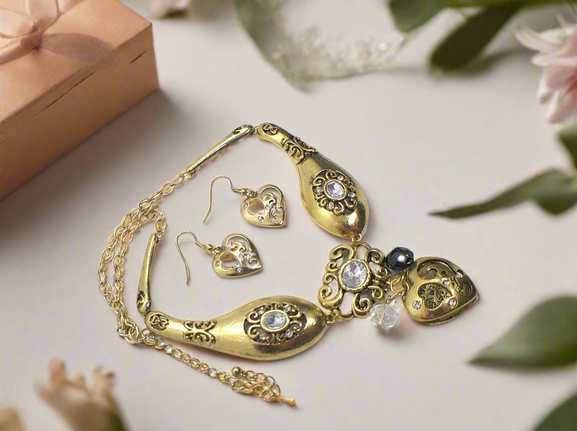 https://www.artistryjewelry.net/products/heart-and-rhinestone-necklace-set