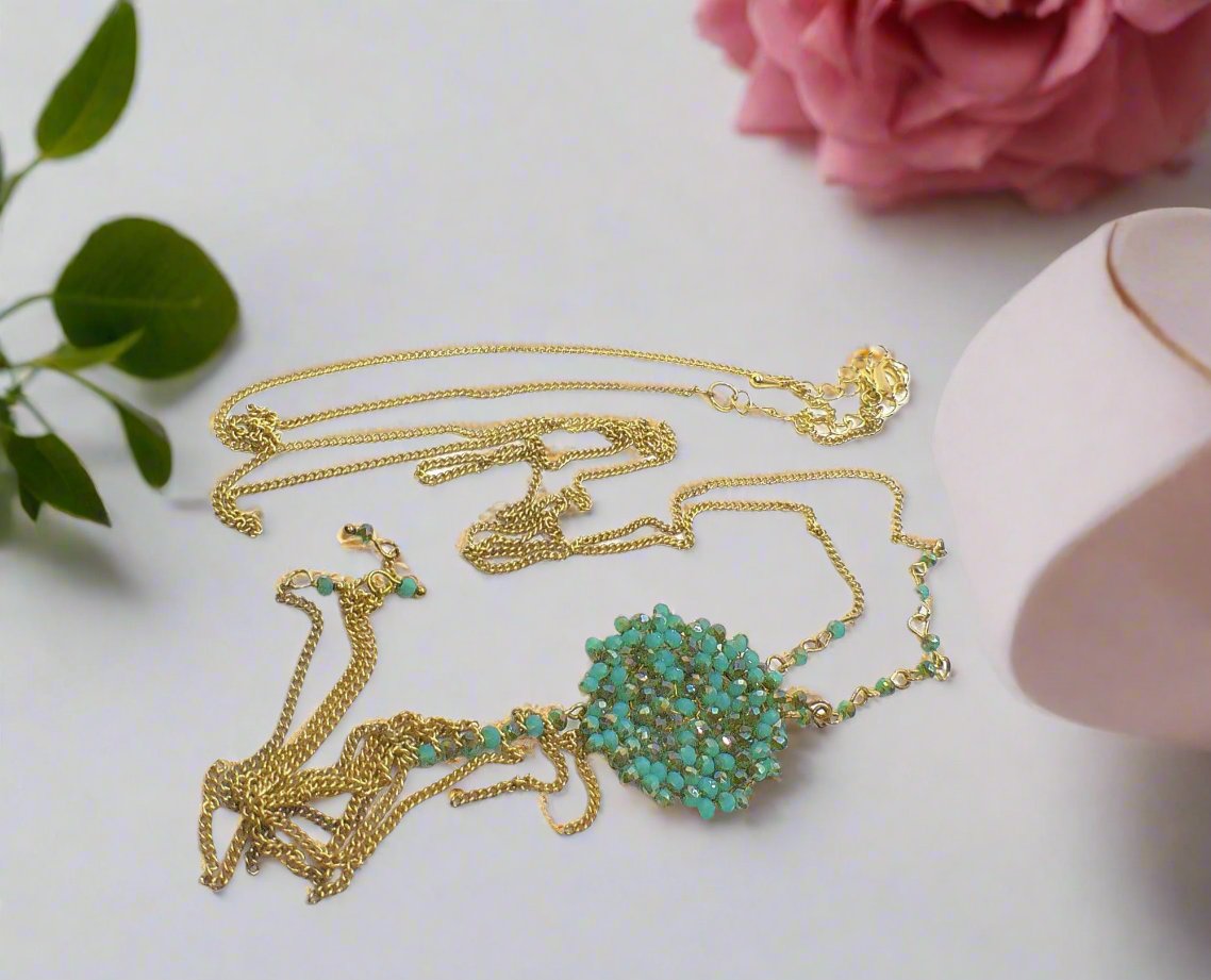 https://www.artistryjewelry.net/products/lovely-long-green-crystal-necklace