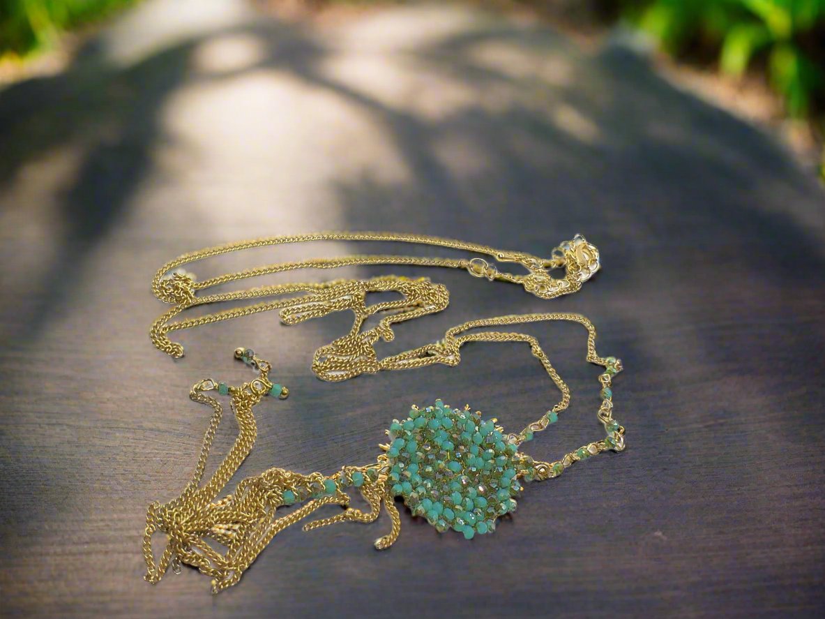 https://www.artistryjewelry.net/products/lovely-long-green-crystal-necklace