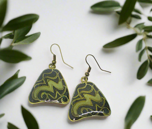 https://www.artistryjewelry.net/products/lovely-green-glitter-earrings