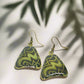 https://www.artistryjewelry.net/products/lovely-green-glitter-earrings
