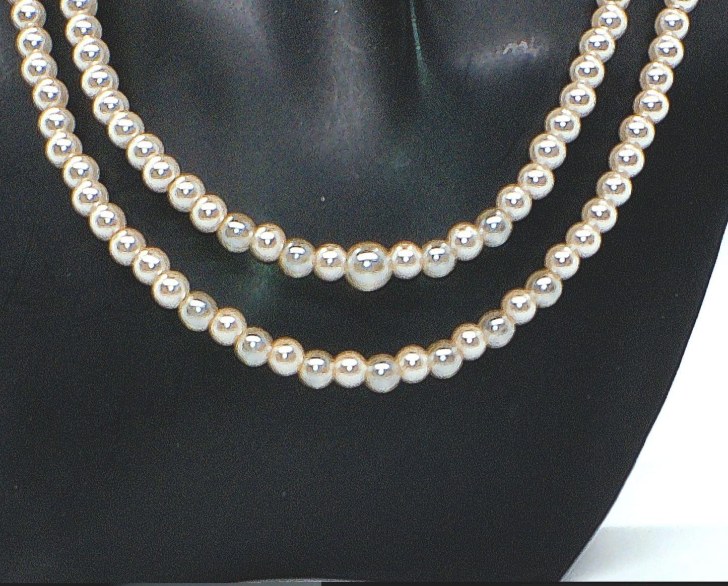 Beautiful Light Peach, Stardust, and Pearl, Two-Strand Beaded Necklace handcrafted by Artistry Jewelry