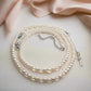 https://www.artistryjewelry.net/products/beautiful-light-peach-stardust-and-pearl-two-strand-beaded-necklace-handcrafted-by-artistry-jewelry