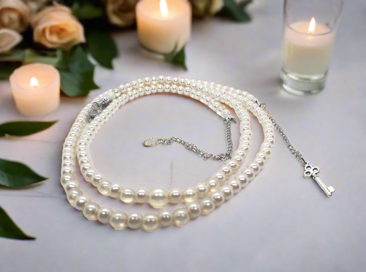 https://www.artistryjewelry.net/products/beautiful-light-peach-stardust-and-pearl-two-strand-beaded-necklace-handcrafted-by-artistry-jewelry