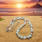 Brilliant Sky Blue Jasper, Crystals, and Onyx Beaded Necklace-handcrafted by Artistry Jewelry