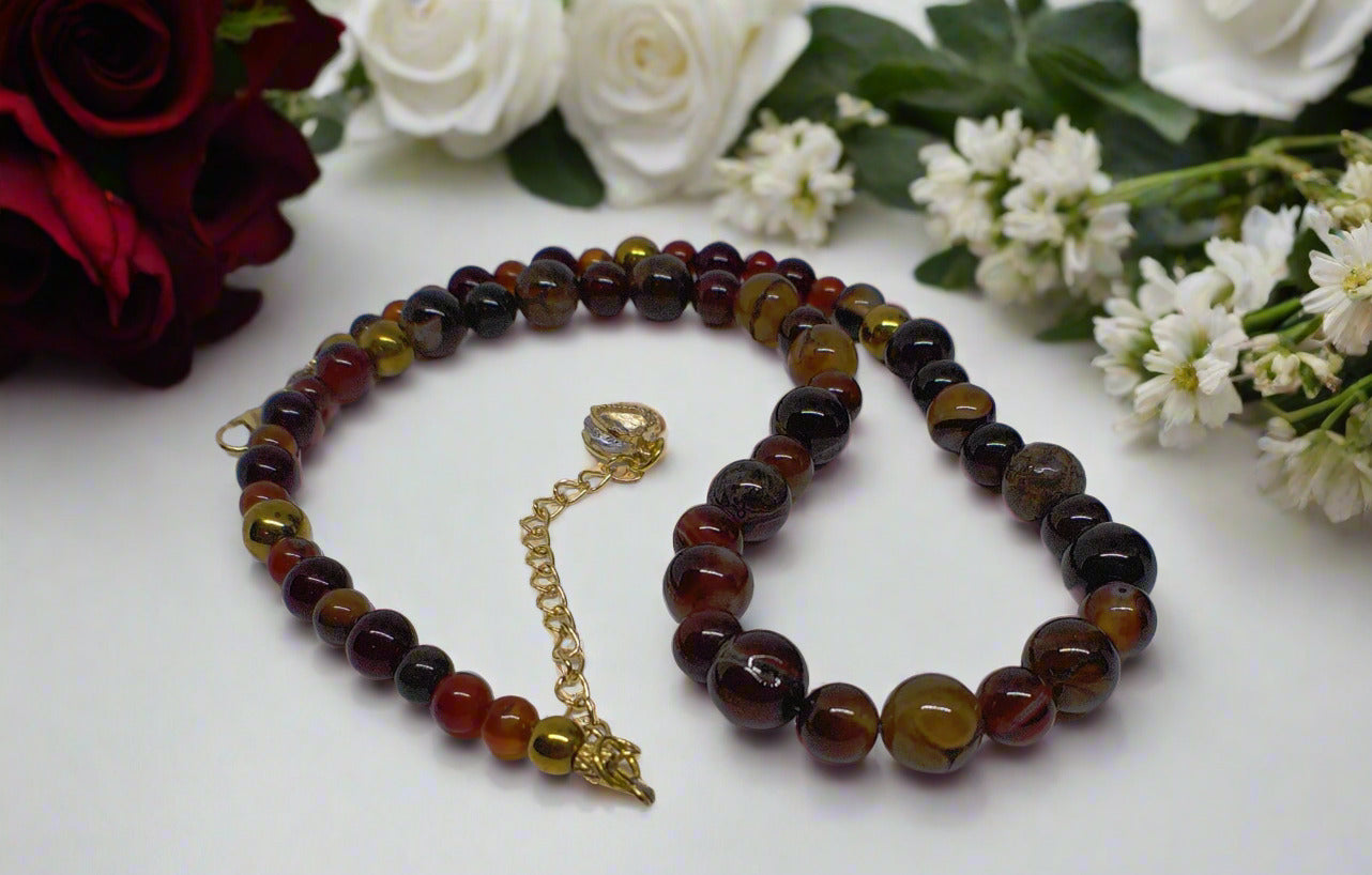 https://www.artistryjewelry.net/products/alluring-carnelian-round-agate-and-hematite-beaded-nacklace