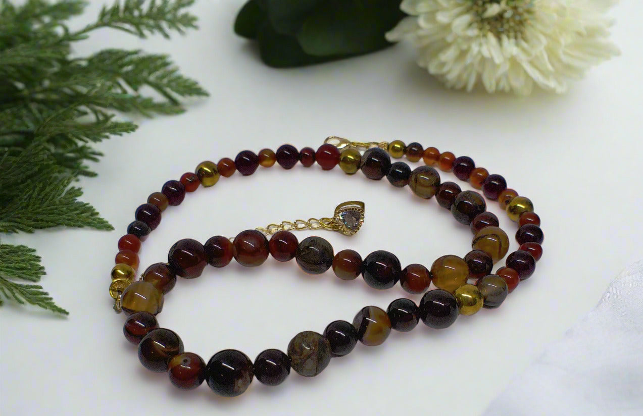 https://www.artistryjewelry.net/products/alluring-carnelian-round-agate-and-hematite-beaded-nacklace