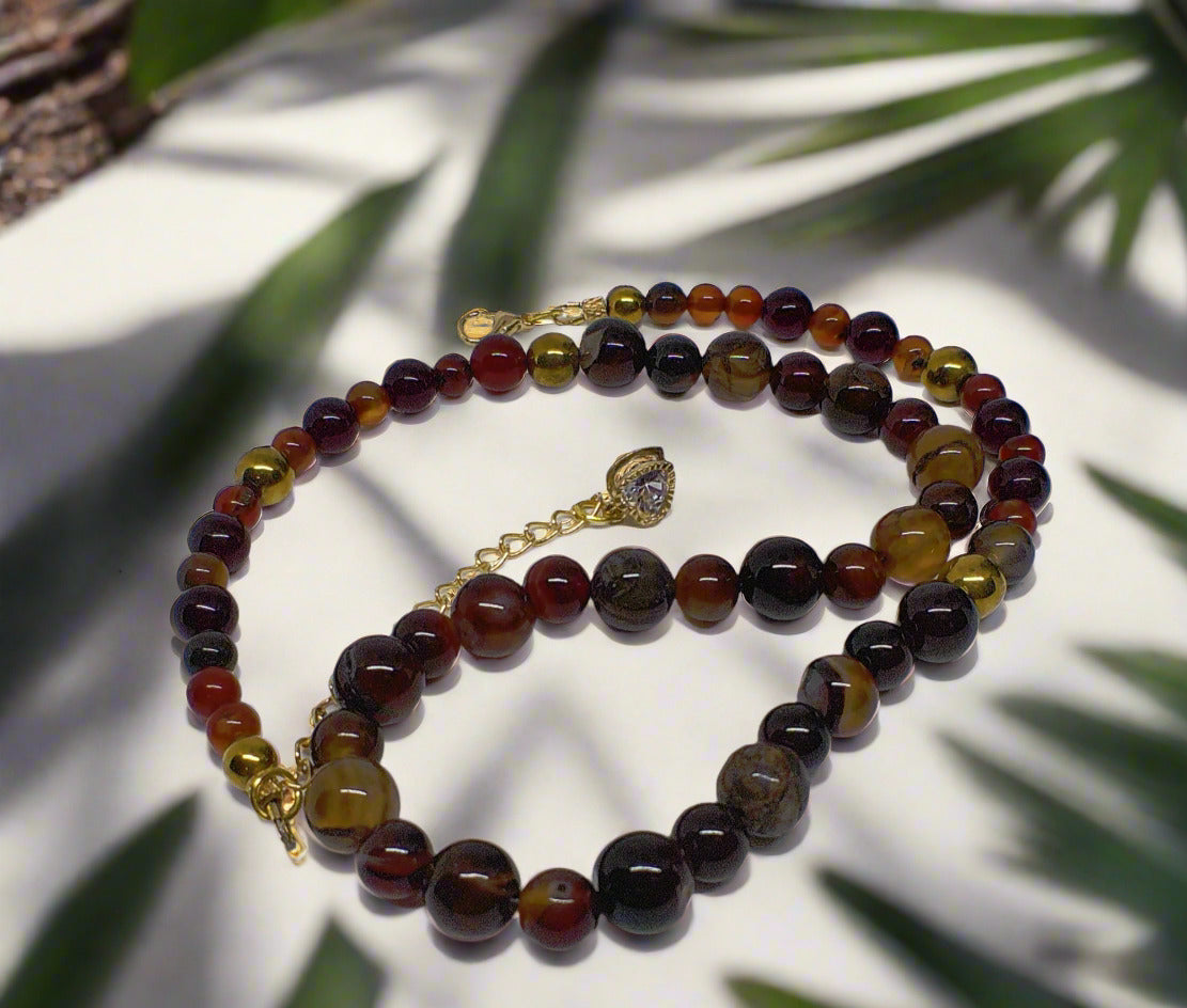 https://www.artistryjewelry.net/products/alluring-carnelian-round-agate-and-hematite-beaded-nacklace