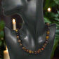 https://www.artistryjewelry.net/products/alluring-carnelian-round-agate-and-hematite-beaded-nacklace