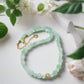 https://www.artistryjewelry.net/products/alluring-burness-jade-crystal-and-hematite-beaded-necklace-by-artistry-jewelry