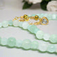 https://www.artistryjewelry.net/products/alluring-burness-jade-crystal-and-hematite-beaded-necklace-by-artistry-jewelry