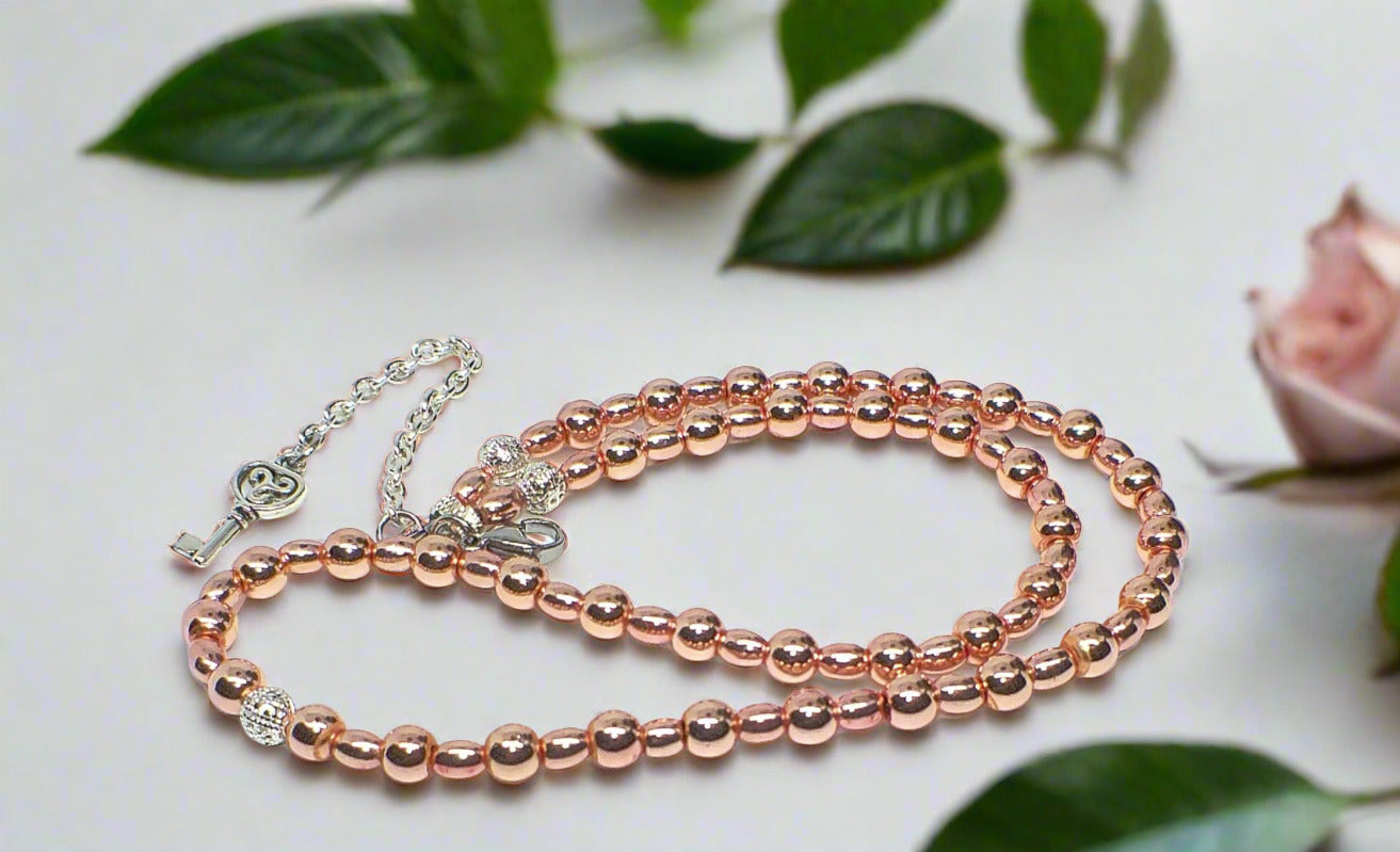 https://www.artistryjewelry.net/products/charming-rose-gold-hematite-beaded-necklace