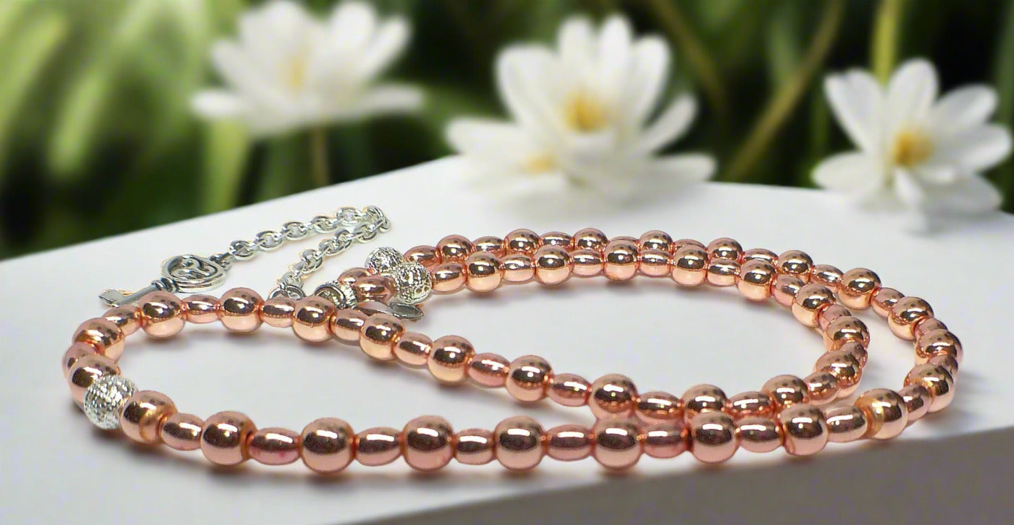 https://www.artistryjewelry.net/products/charming-rose-gold-hematite-beaded-necklace