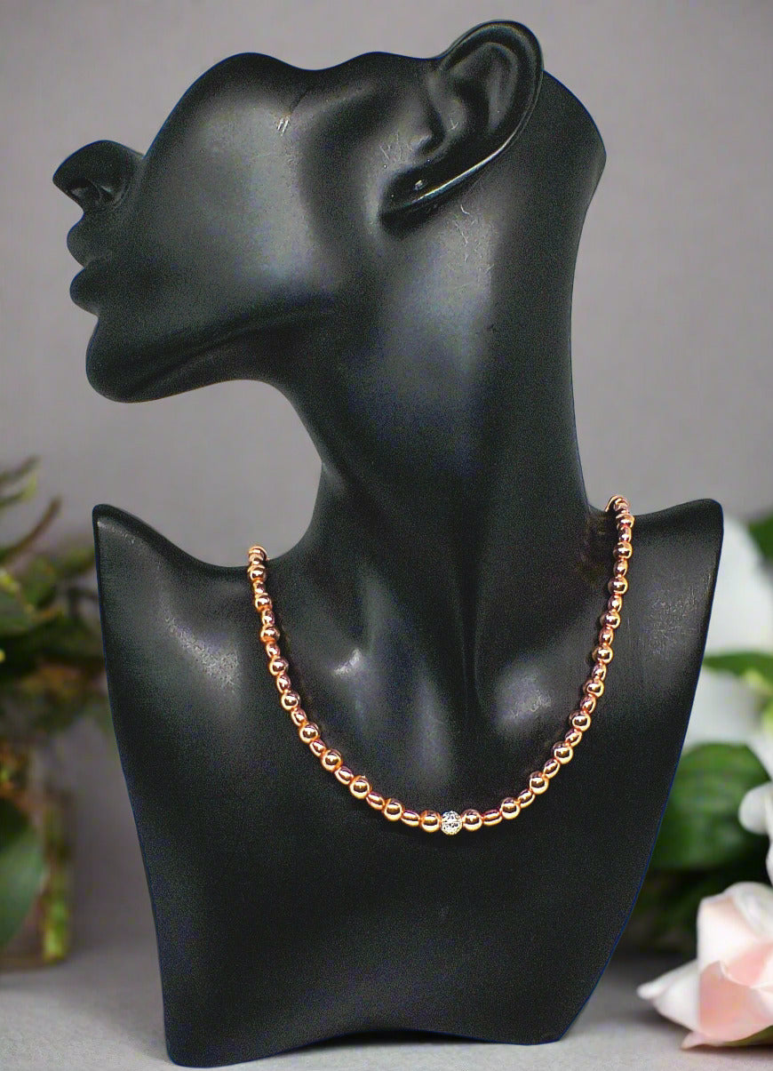 https://www.artistryjewelry.net/products/charming-rose-gold-hematite-beaded-necklace