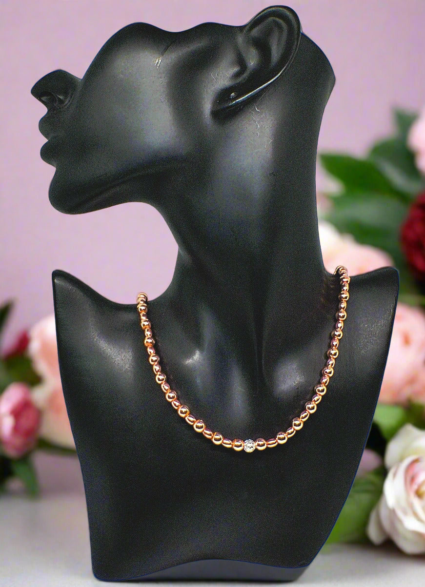 https://www.artistryjewelry.net/products/charming-rose-gold-hematite-beaded-necklace