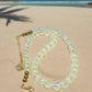 https://www.artistryjewelry.net/products/magnificent-celestial-opal-crystal-and-hematite-beaded-necklace