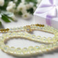 https://www.artistryjewelry.net/products/magnificent-celestial-opal-crystal-and-hematite-beaded-necklace