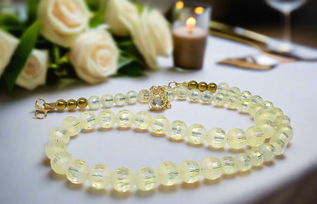 https://www.artistryjewelry.net/products/magnificent-celestial-opal-crystal-and-hematite-beaded-necklace