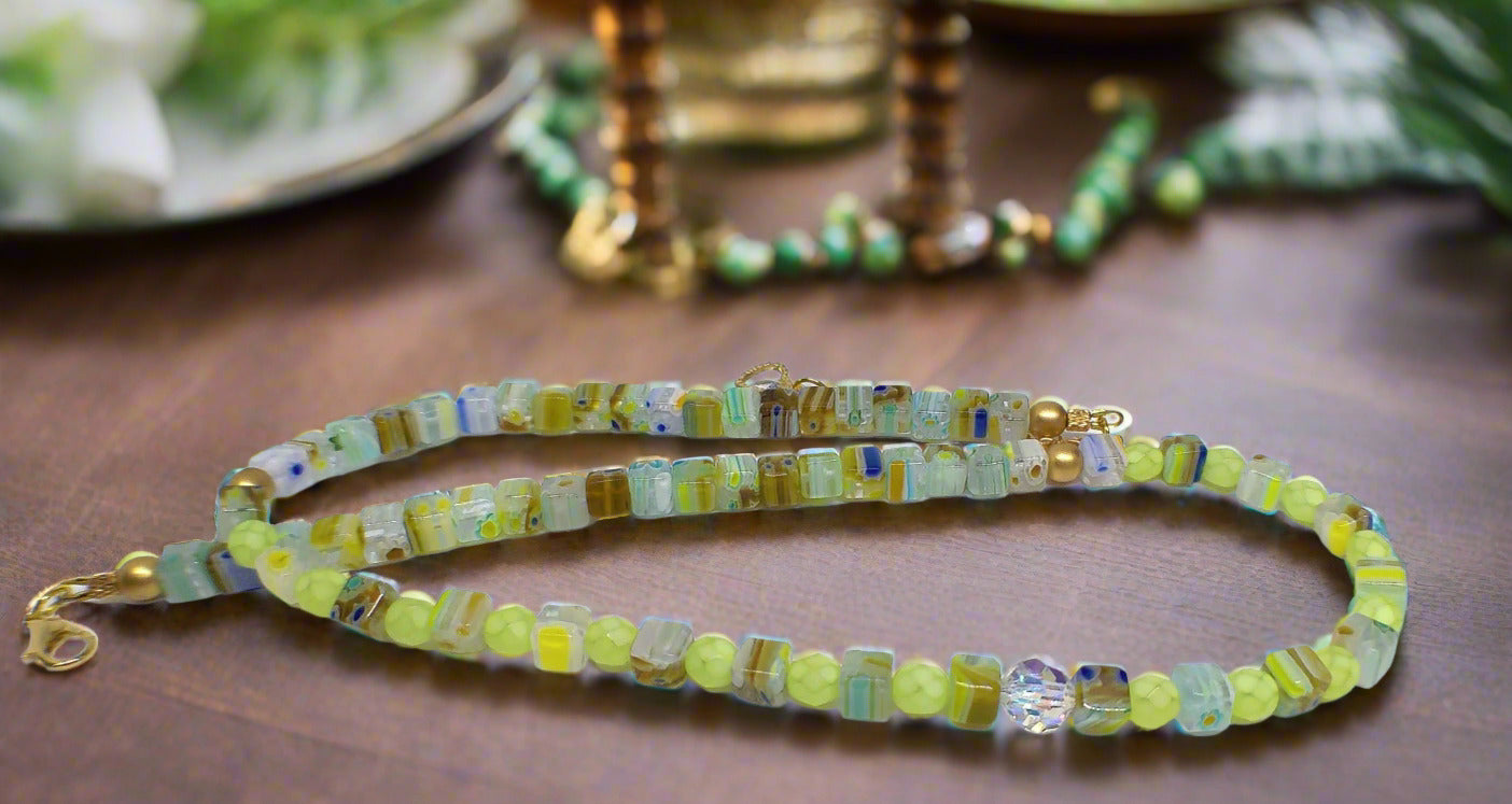 https://www.artistryjewelry.net/products/charming-green-and-gold-beaded-necklace-by-artistry-jewelry