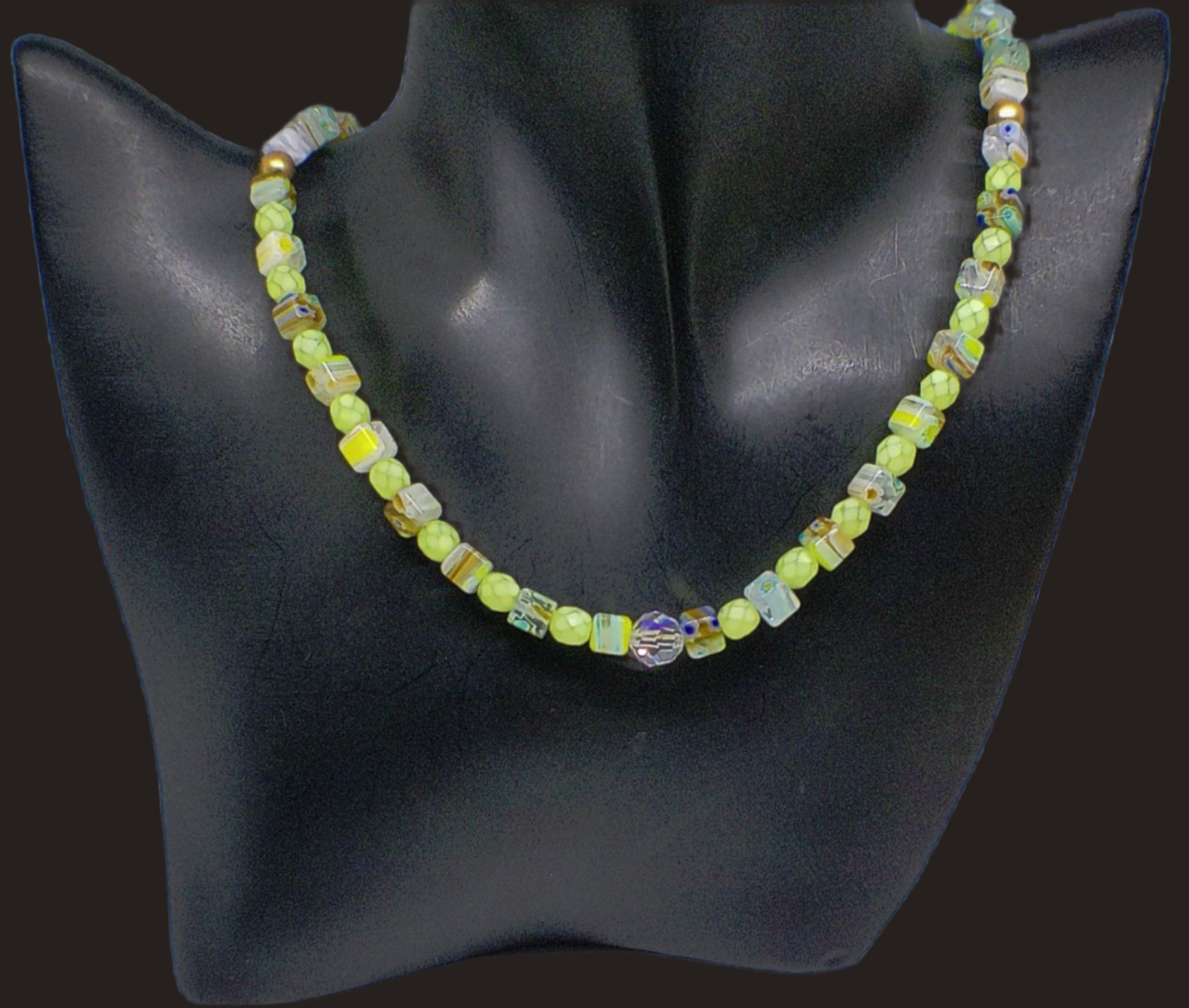 https://www.artistryjewelry.net/products/charming-green-and-gold-beaded-necklace-by-artistry-jewelry