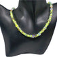 https://www.artistryjewelry.net/products/charming-green-and-gold-beaded-necklace-by-artistry-jewelry