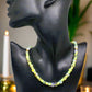 https://www.artistryjewelry.net/products/charming-green-and-gold-beaded-necklace-by-artistry-jewelry