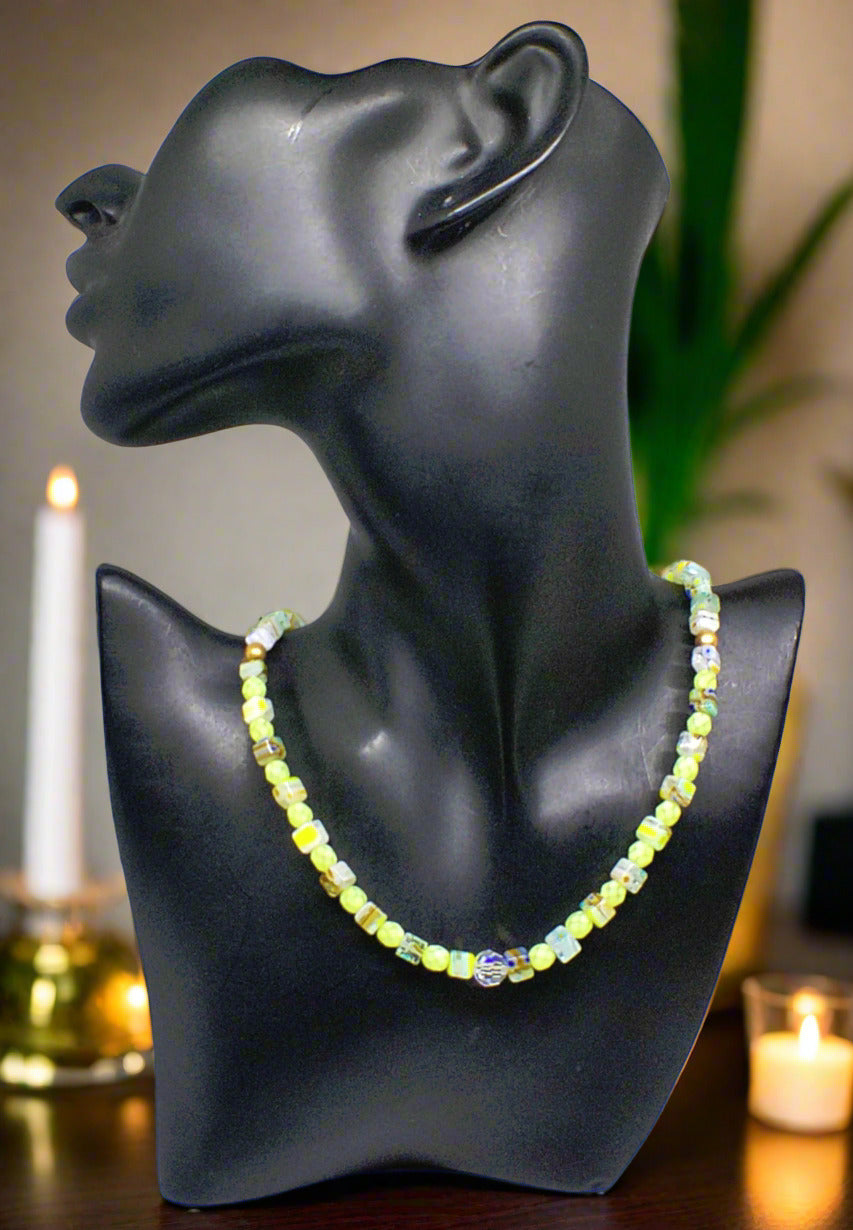 https://www.artistryjewelry.net/products/charming-green-and-gold-beaded-necklace-by-artistry-jewelry