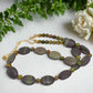 https://www.artistryjewelry.net/products/alluring-mocha-mint-jasper-unakite-and-hematite-beaded-necklace-by-artistry-jewelry