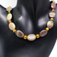 https://www.artistryjewelry.net/products/alluring-mocha-mint-jasper-unakite-and-hematite-beaded-necklace-by-artistry-jewelry