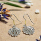 https://www.artistryjewelry.net/products/attractrive-shell-drop-earrings