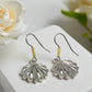https://www.artistryjewelry.net/products/attractrive-shell-drop-earrings