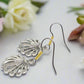 https://www.artistryjewelry.net/products/attractrive-shell-drop-earrings