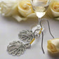 https://www.artistryjewelry.net/products/attractrive-shell-drop-earrings