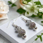 https://www.artistryjewelry.net/products/elegant-silver-and-crystal-drop-earrings