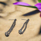 https://www.artistryjewelry.net/products/alluring-black-rhinestone-dangle-earrings