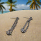 https://www.artistryjewelry.net/products/alluring-black-rhinestone-dangle-earrings