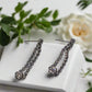 https://www.artistryjewelry.net/products/alluring-black-rhinestone-dangle-earrings