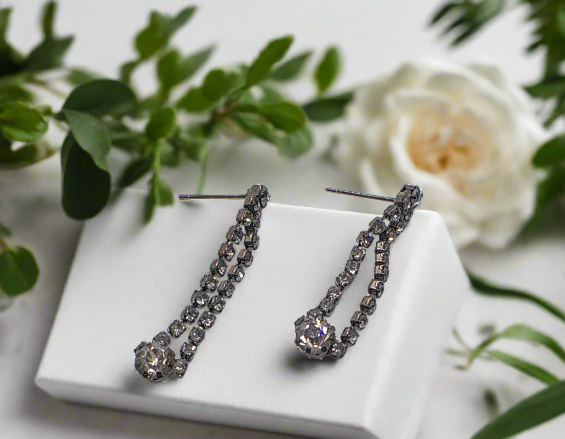 https://www.artistryjewelry.net/products/alluring-black-rhinestone-dangle-earrings