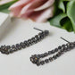 https://www.artistryjewelry.net/products/alluring-black-rhinestone-dangle-earrings
