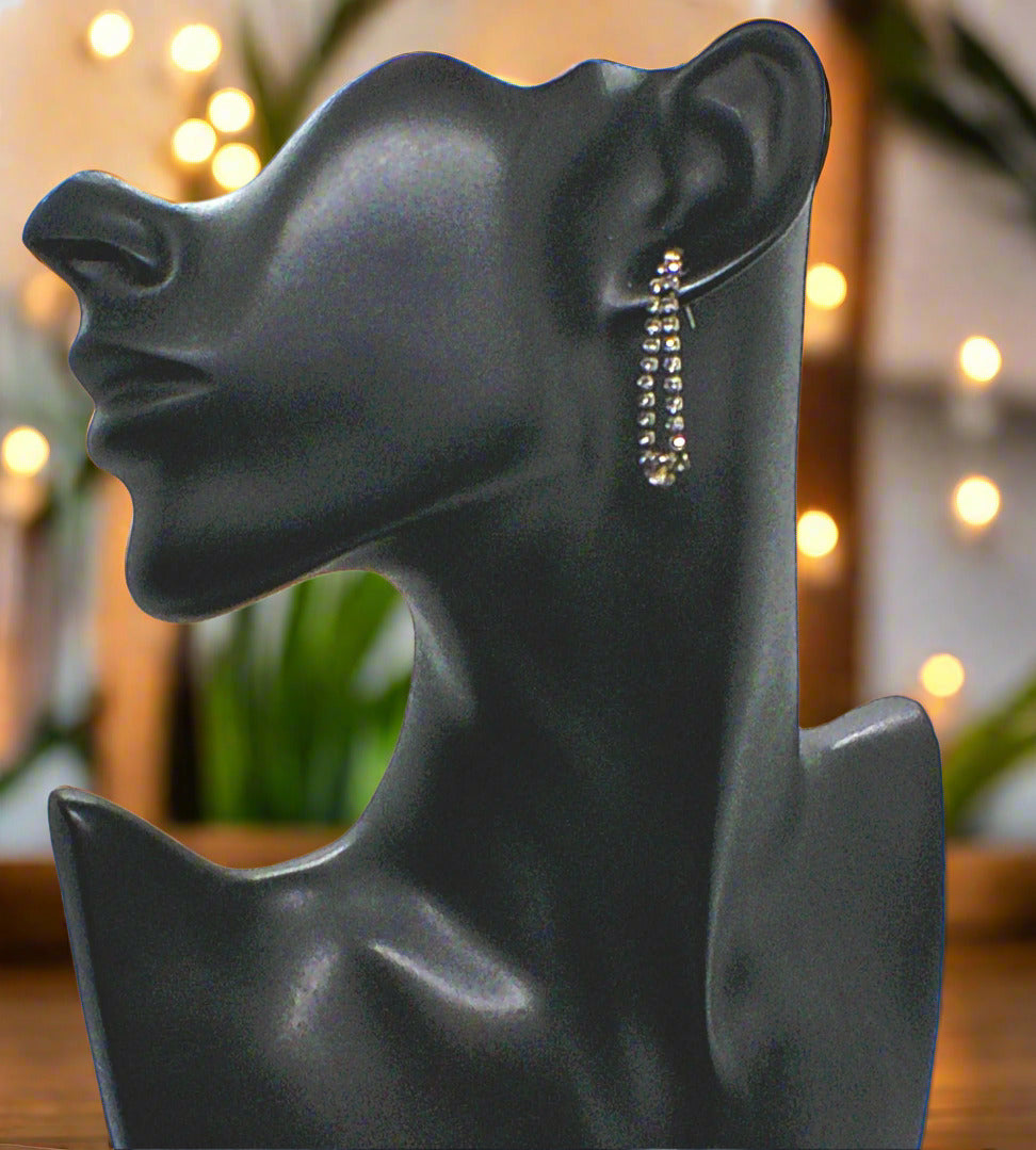 https://www.artistryjewelry.net/products/alluring-black-rhinestone-dangle-earrings