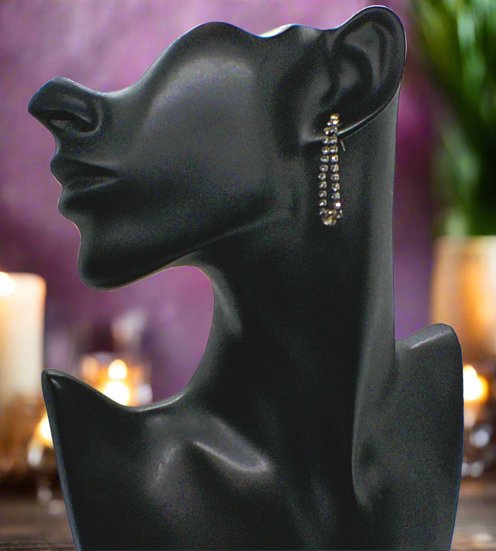 https://www.artistryjewelry.net/products/alluring-black-rhinestone-dangle-earrings