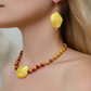 Dazzling Oranges, Tans, and Yellow Mixed Pattered Wood Beads in This Tropical Show Necklace, One-of-a-Kind-handcrafted by Artistry Jewelry