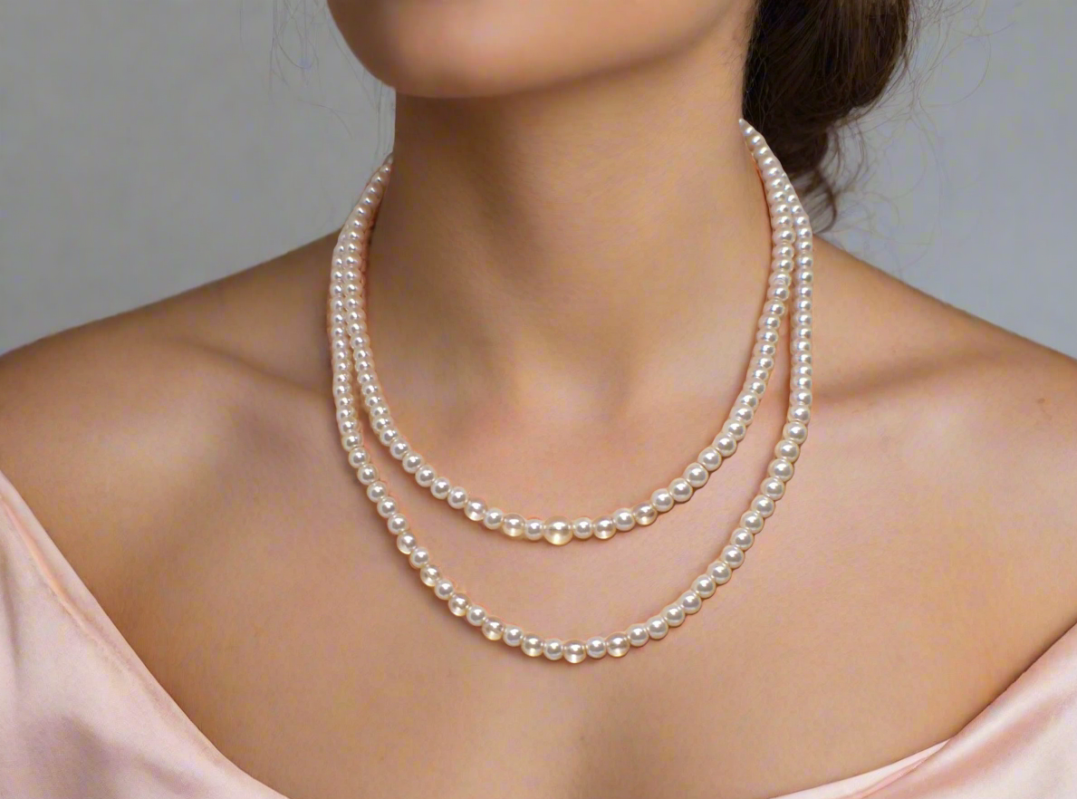 Beautiful Light Peach, Stardust, and Pearl, Two-Strand Beaded Necklace handcrafted by Artistry Jewelry