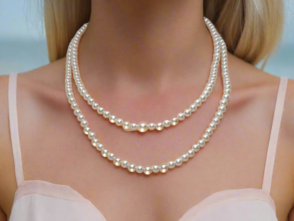 Beautiful Light Peach, Stardust, and Pearl, Two-Strand Beaded Necklace handcrafted by Artistry Jewelry