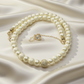 Alluring Ivory, Gold and Crystal Necklace
