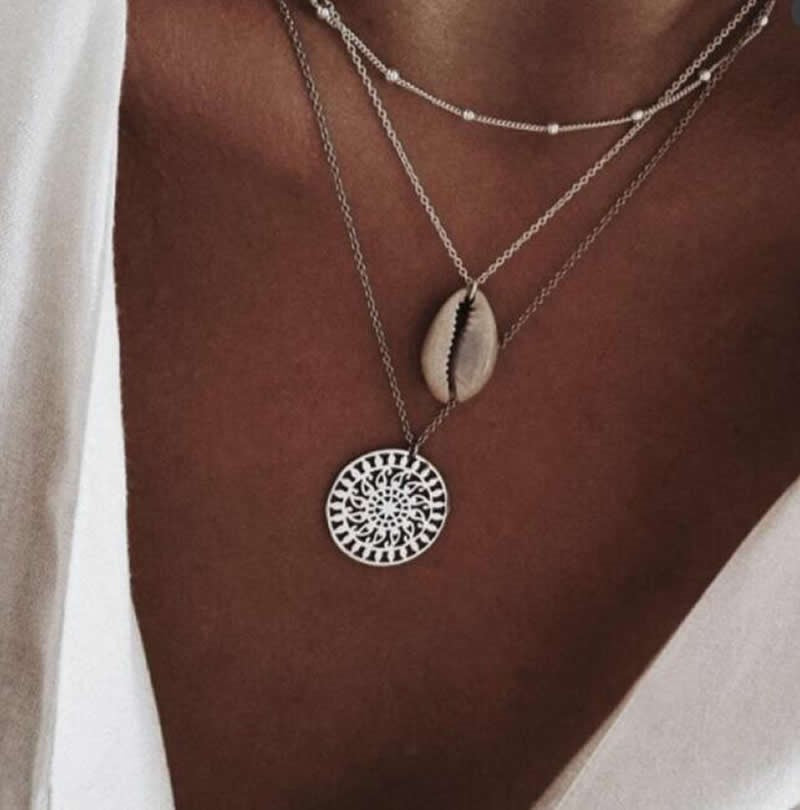 https://www.artistryjewelry.net/products/silver-shell-multilayer-necklace
